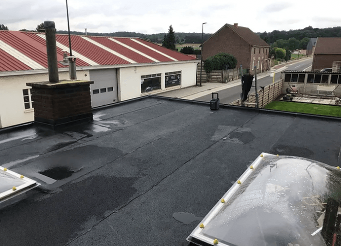 Plat dak isoleren van buitenaf Lubbeek (Kortenaken), Vlaams-Brabant
